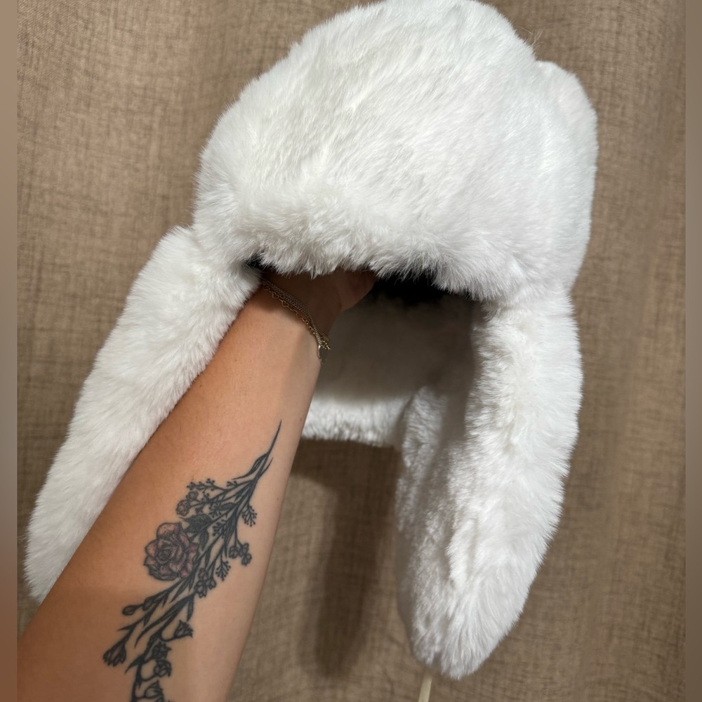 White faux fur hat